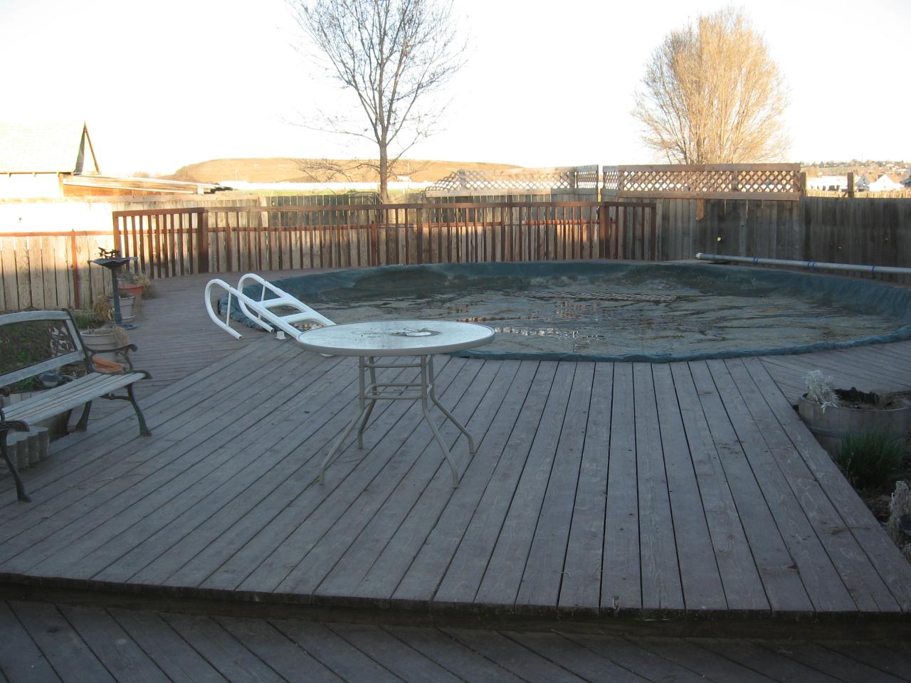 1913 Outlook Road Outlook, WA 98938 - Photo 3 of 5 a view of a roof deck with wooden floor and fence with a yard