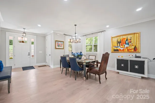 a view of a livingroom with furniture and a flat screen tv
