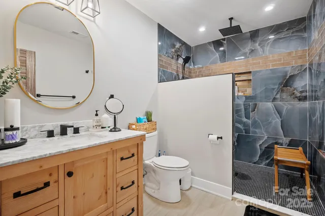 a bedroom with a bed and furniture