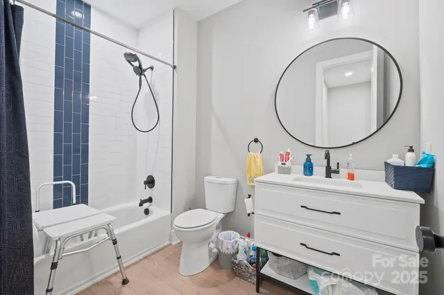 a living room with furniture a air conditioner vent and a window