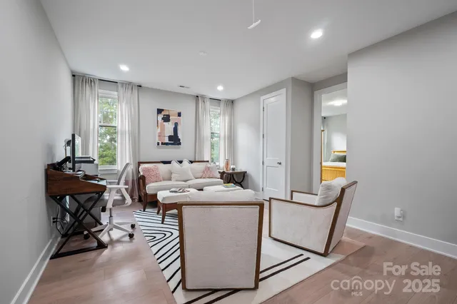 a spacious bathroom with 2 sink tub and a mirror