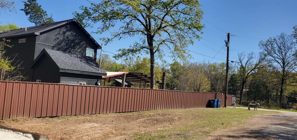 7102 Tejas Bend Mabank, TX 75156 - Photo 2 of 20 a view of a house with a fence