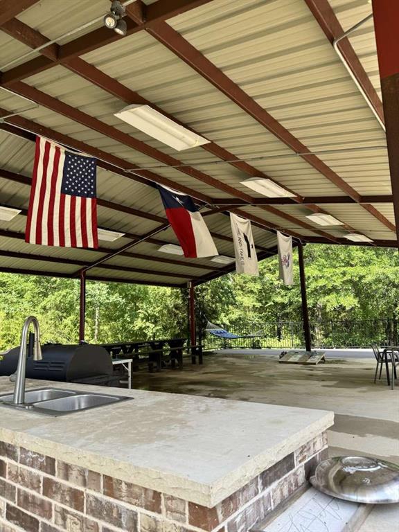 7102 Tejas Bend Mabank, TX 75156 - Photo 5 of 20 a view of a backyard with a patio