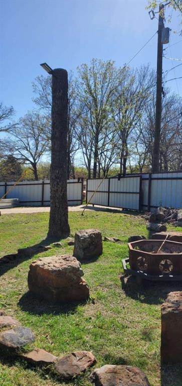 7102 Tejas Bend Mabank, TX 75156 - Photo 6 of 20 a view of a yard with large tree