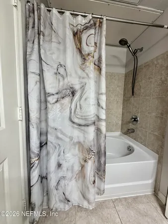 a bathroom with a bathtub