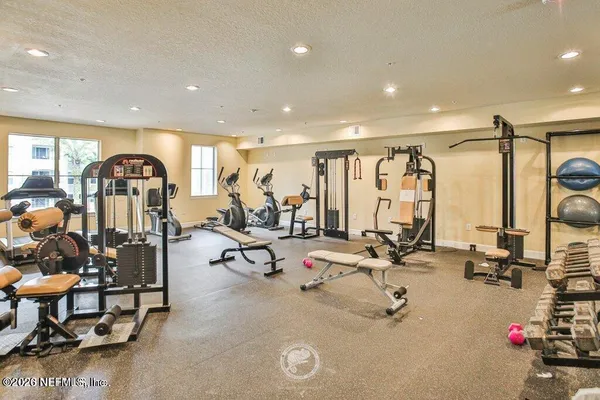 a view of a room with gym equipment