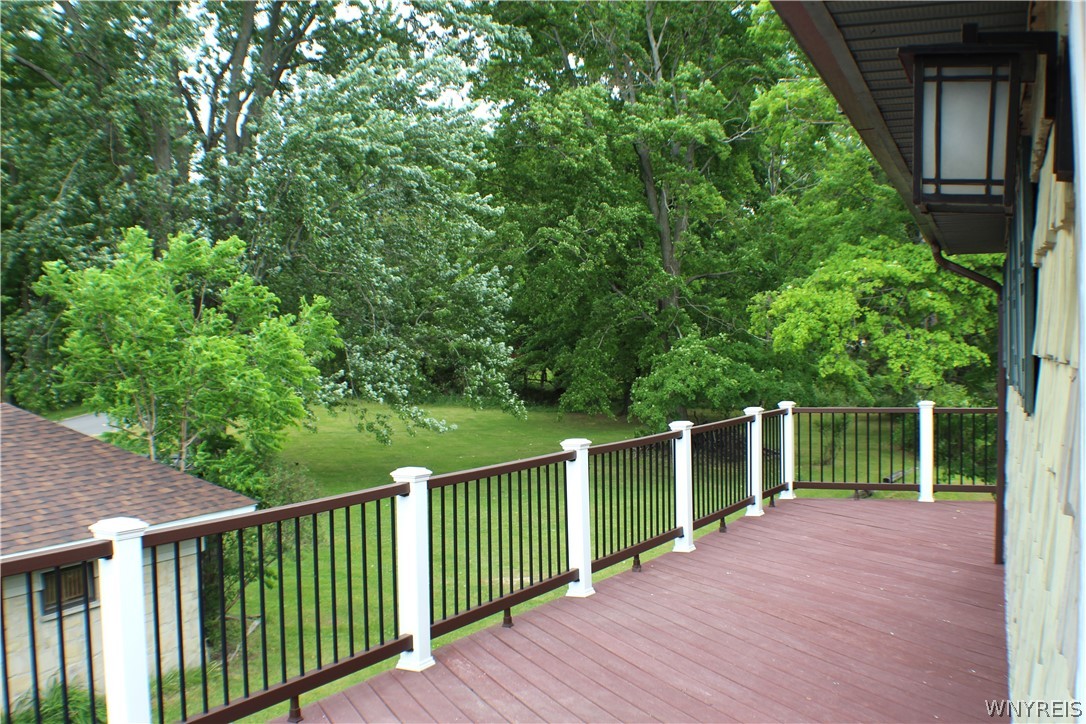 94 Longview Avenue Ellicott, NY 14701 - Photo 9 of 48 2nd story deck with stairs at the back that leads