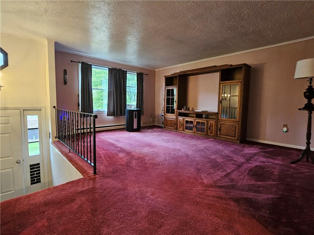 261 Whitestown Road Butler, PA 16001 - Photo 10 of 43 a view of livingroom with furniture and floor to ceiling window