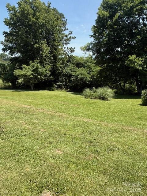 5949 Flat Creek Road Kershaw, SC 29067 - Photo 2 of 20 a view of a field with an trees