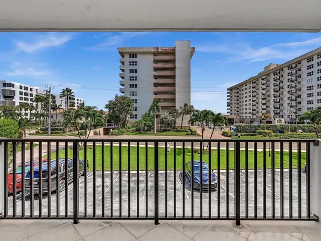 a view of a balcony with an outdoor space