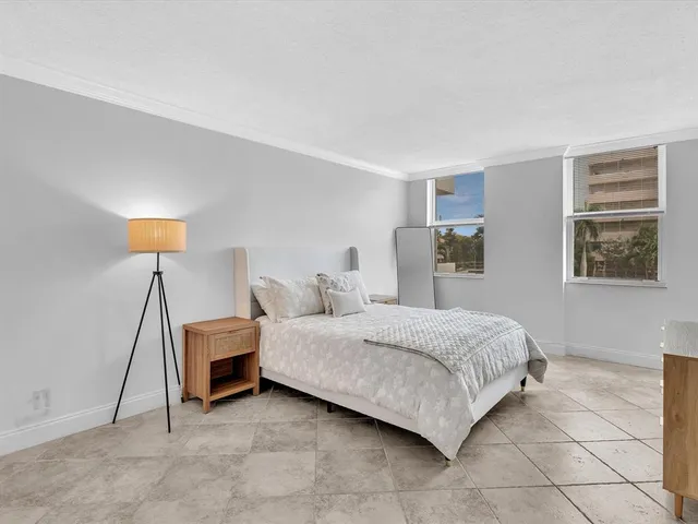 a bathroom with a shower and a toilet