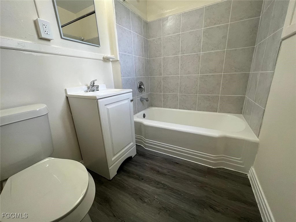 3165 East Riverside Drive, Unit 3175 Fort Myers, FL 33916 - Photo 8 of 8 a bathroom with a sink and a toilet