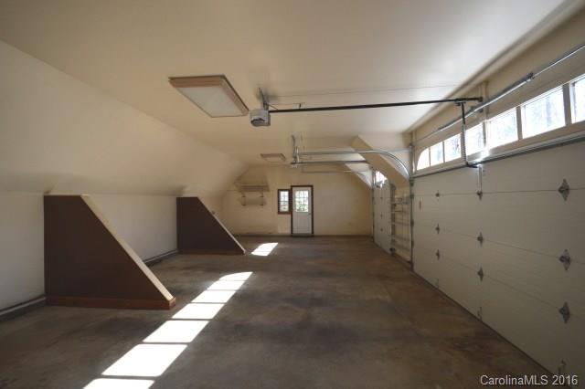 969 Hunting Country Road Tryon, NC 28782 - Photo 11 of 23 a view of a hallway with stairs