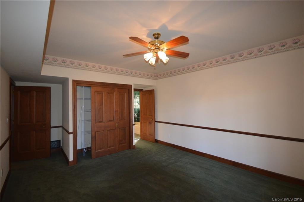 969 Hunting Country Road Tryon, NC 28782 - Photo 17 of 23 a view of an empty room