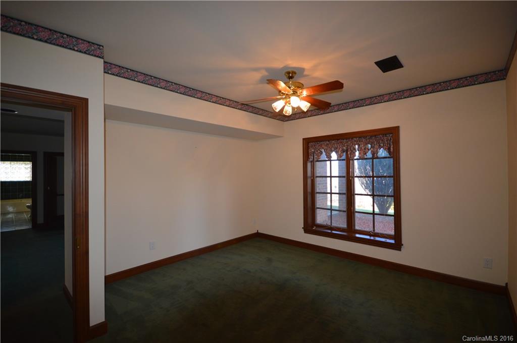 969 Hunting Country Road Tryon, NC 28782 - Photo 18 of 23 a view of an empty room with a window