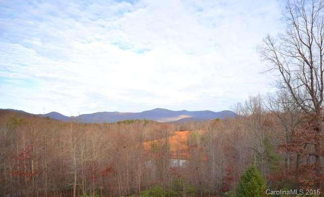 969 Hunting Country Road Tryon, NC 28782 - Photo 3 of 23 a view of lake and mountain