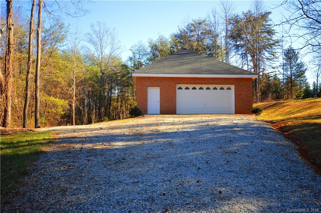 969 Hunting Country Road Tryon, NC 28782 - Photo 21 of 23 a view of large yard with large tree