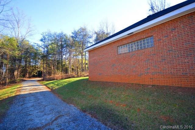 969 Hunting Country Road Tryon, NC 28782 - Photo 22 of 23 a view of back yard of the house