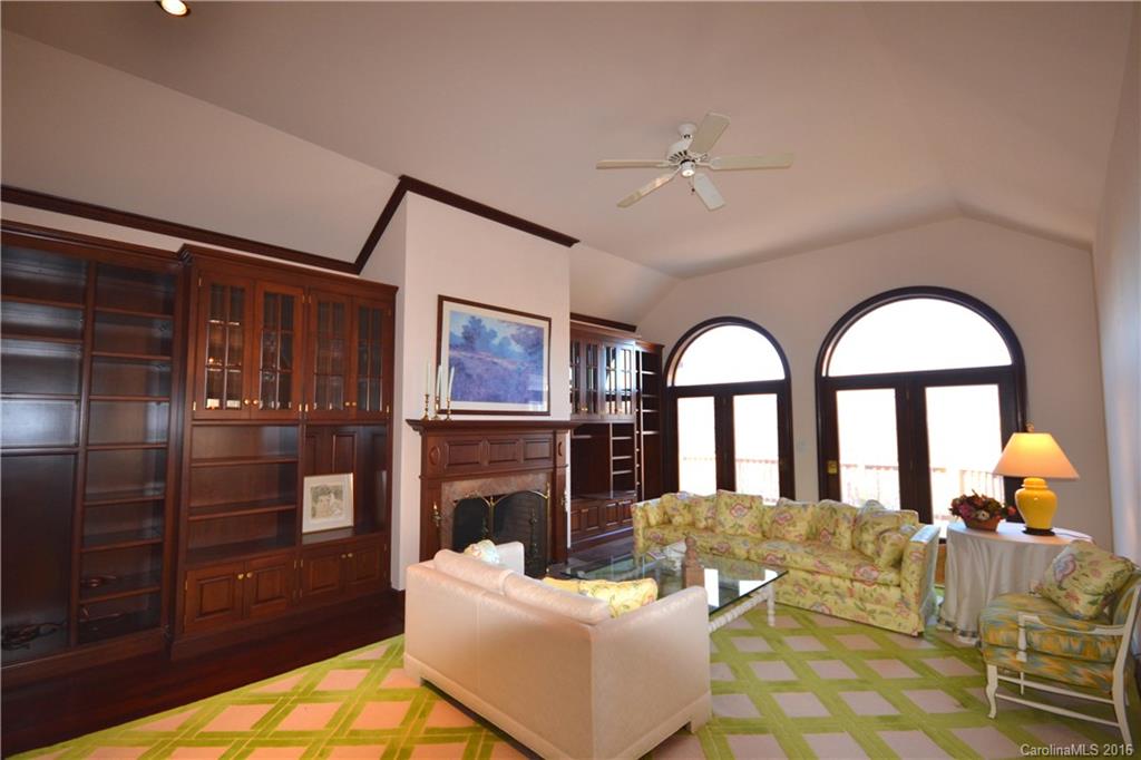 969 Hunting Country Road Tryon, NC 28782 - Photo 6 of 23 a living room with fireplace furniture and a fireplace