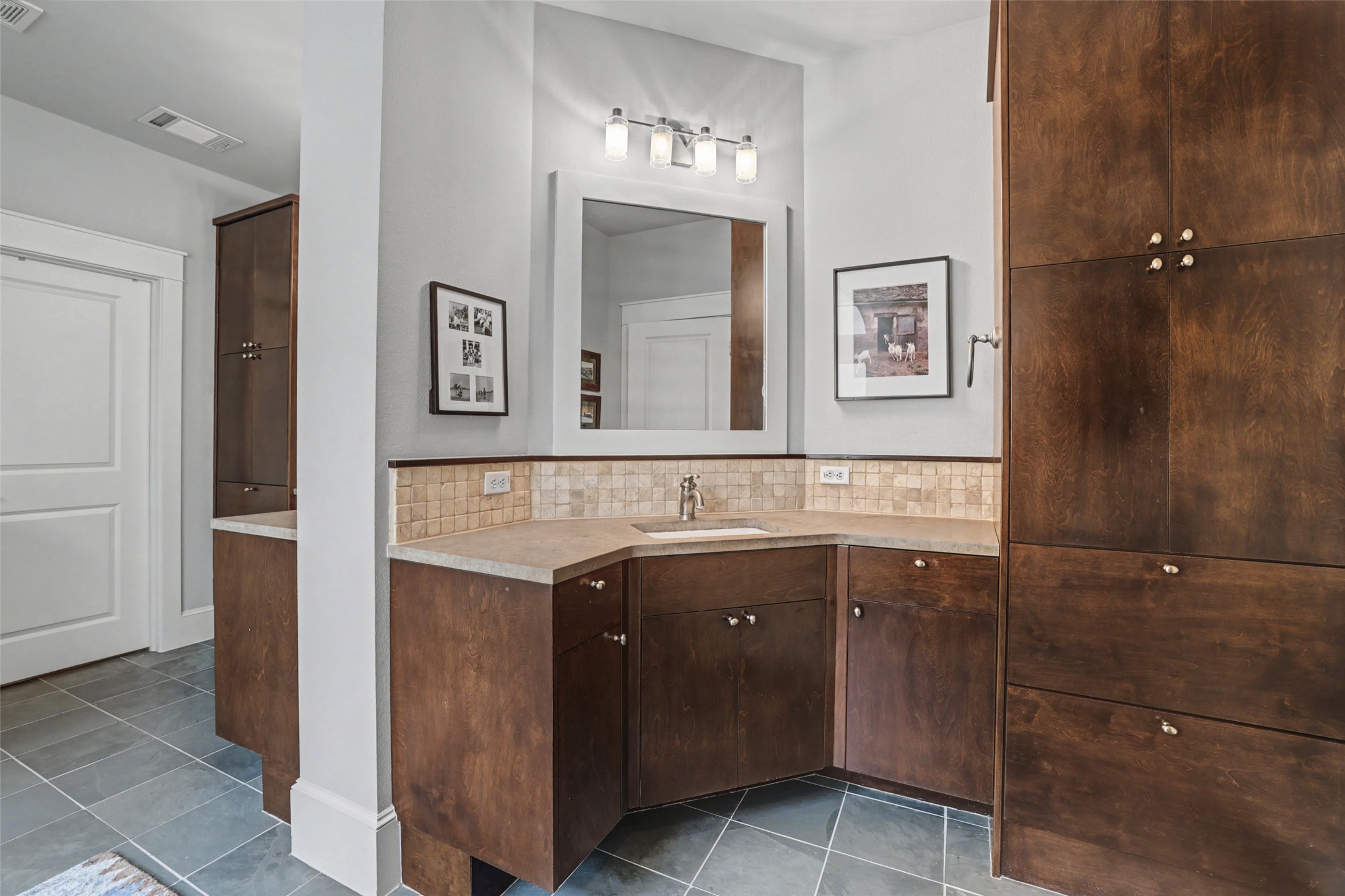 816 Stonewall Ridge Lane Austin, TX 78746 - Photo 21 of 32 Beautiful cabinetry and double sinks for plenty of space to get ready.