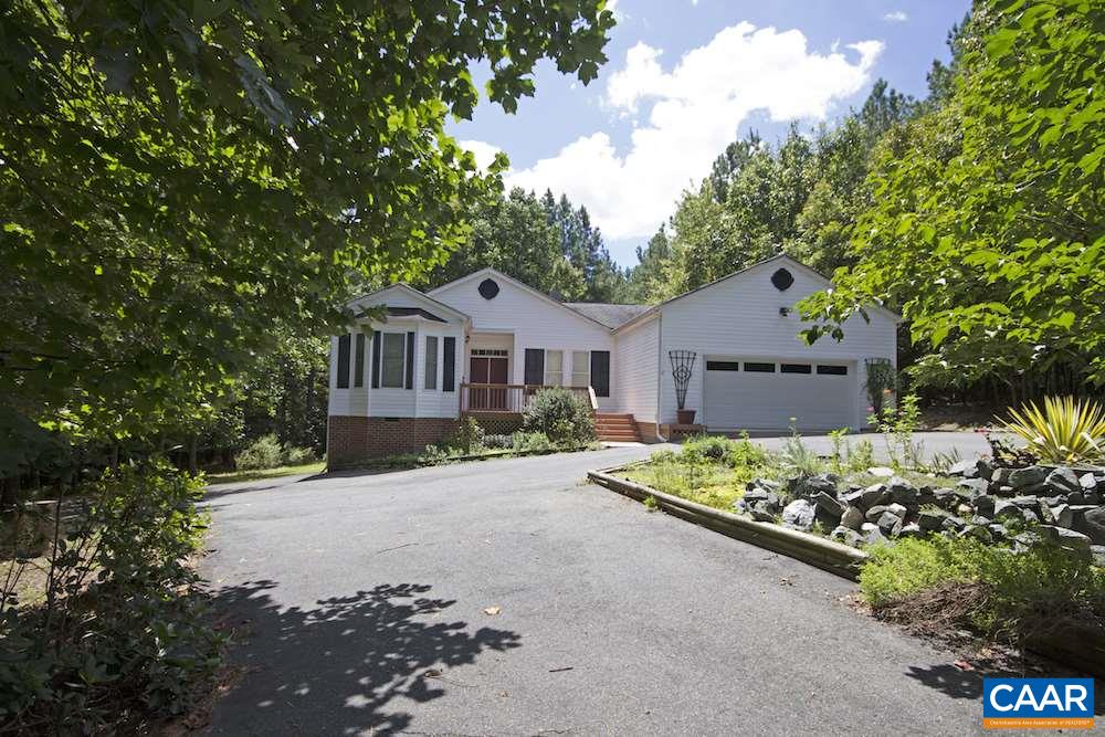 front view of a house with a street