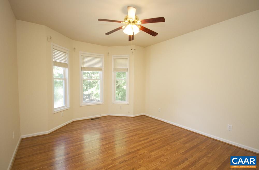 1 Foxmoor Road Troy, VA 22974 - Photo 16 of 25 a view of empty room with wooden floor and fan