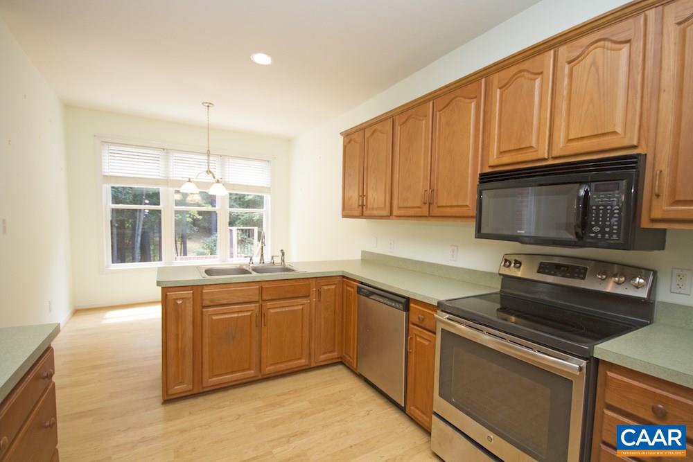 1 Foxmoor Road Troy, VA 22974 - Photo 7 of 25 a kitchen with stainless steel appliances granite countertop a stove a sink and a microwave