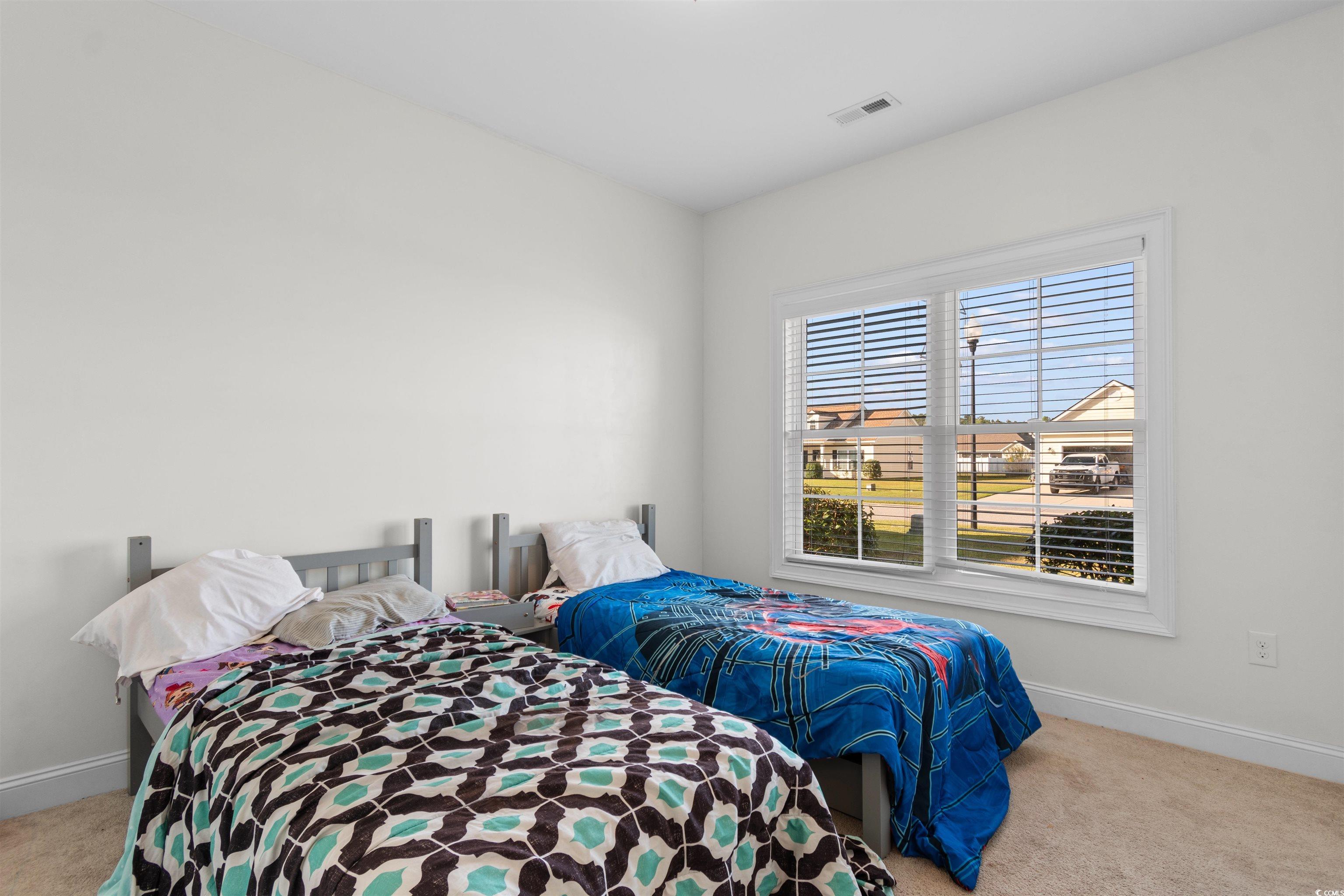 253 Maple Oak Drive Conway, SC 29526 - Photo 18 of 33 Bedroom with light carpet