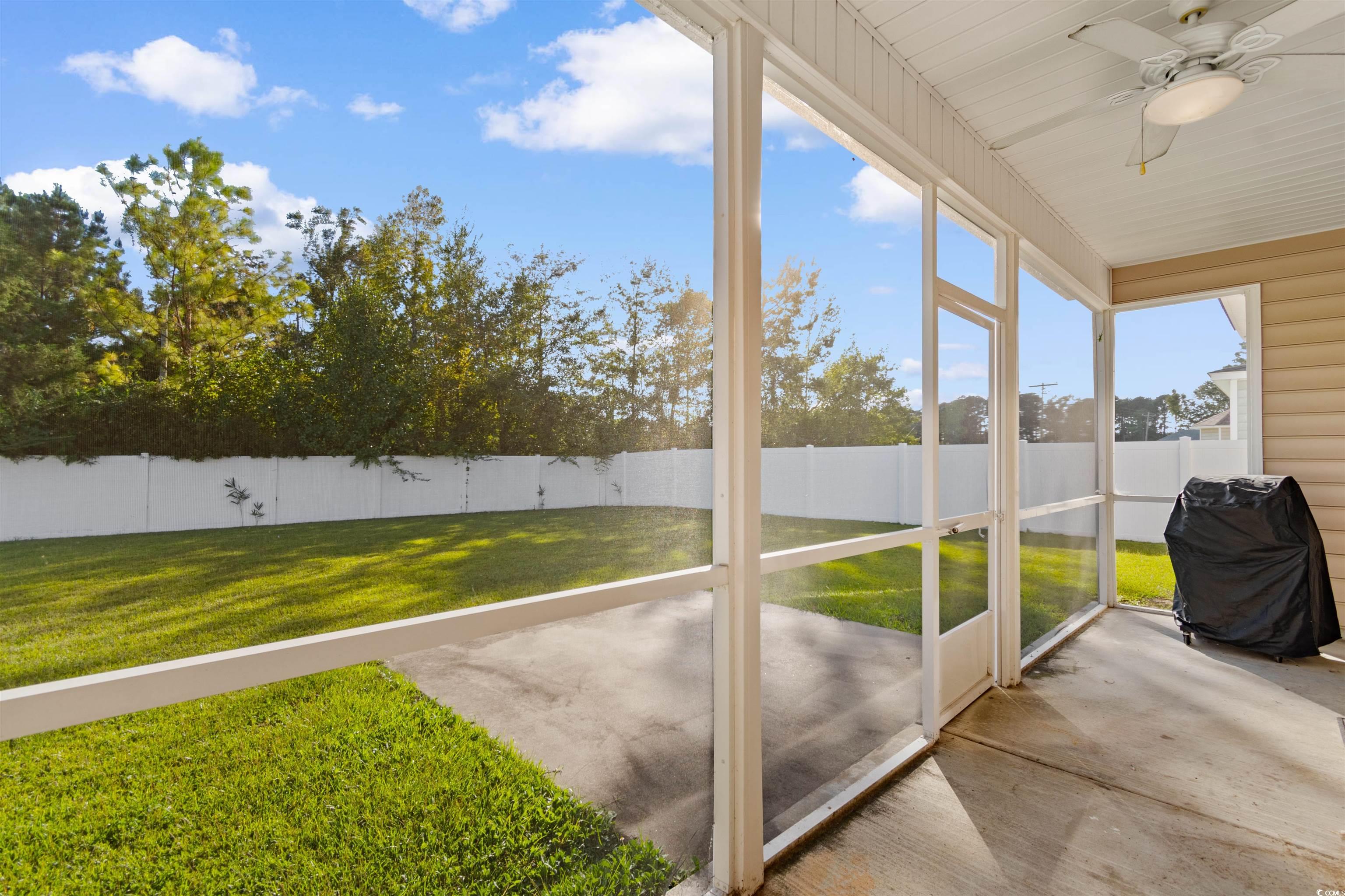 253 Maple Oak Drive Conway, SC 29526 - Photo 24 of 33 Unfurnished sunroom with ceiling fan