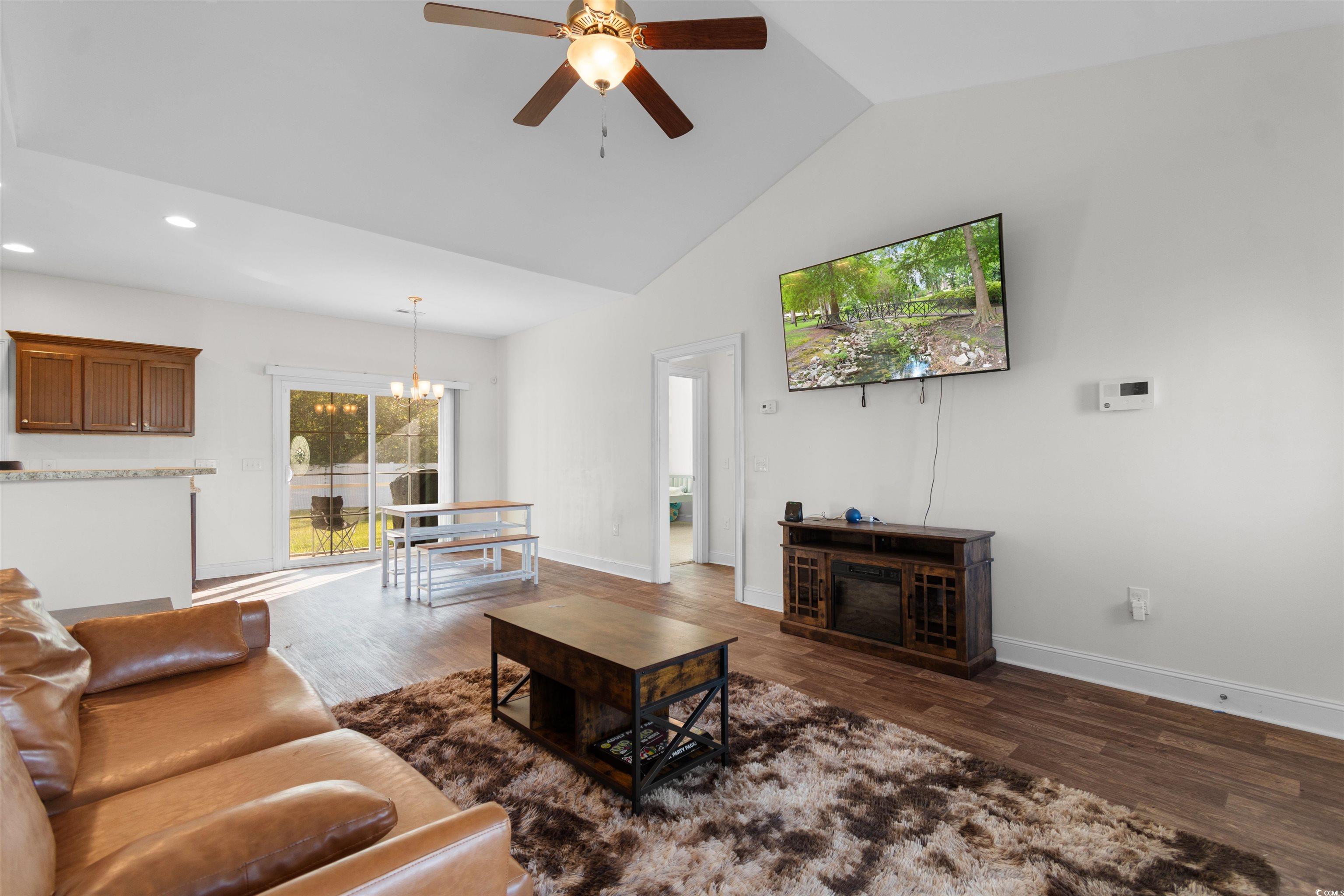 253 Maple Oak Drive Conway, SC 29526 - Photo 7 of 33 Living area featuring dark wood-style floors, a chandelier, ceiling fan, high vaulted ceiling, and recessed lighting
