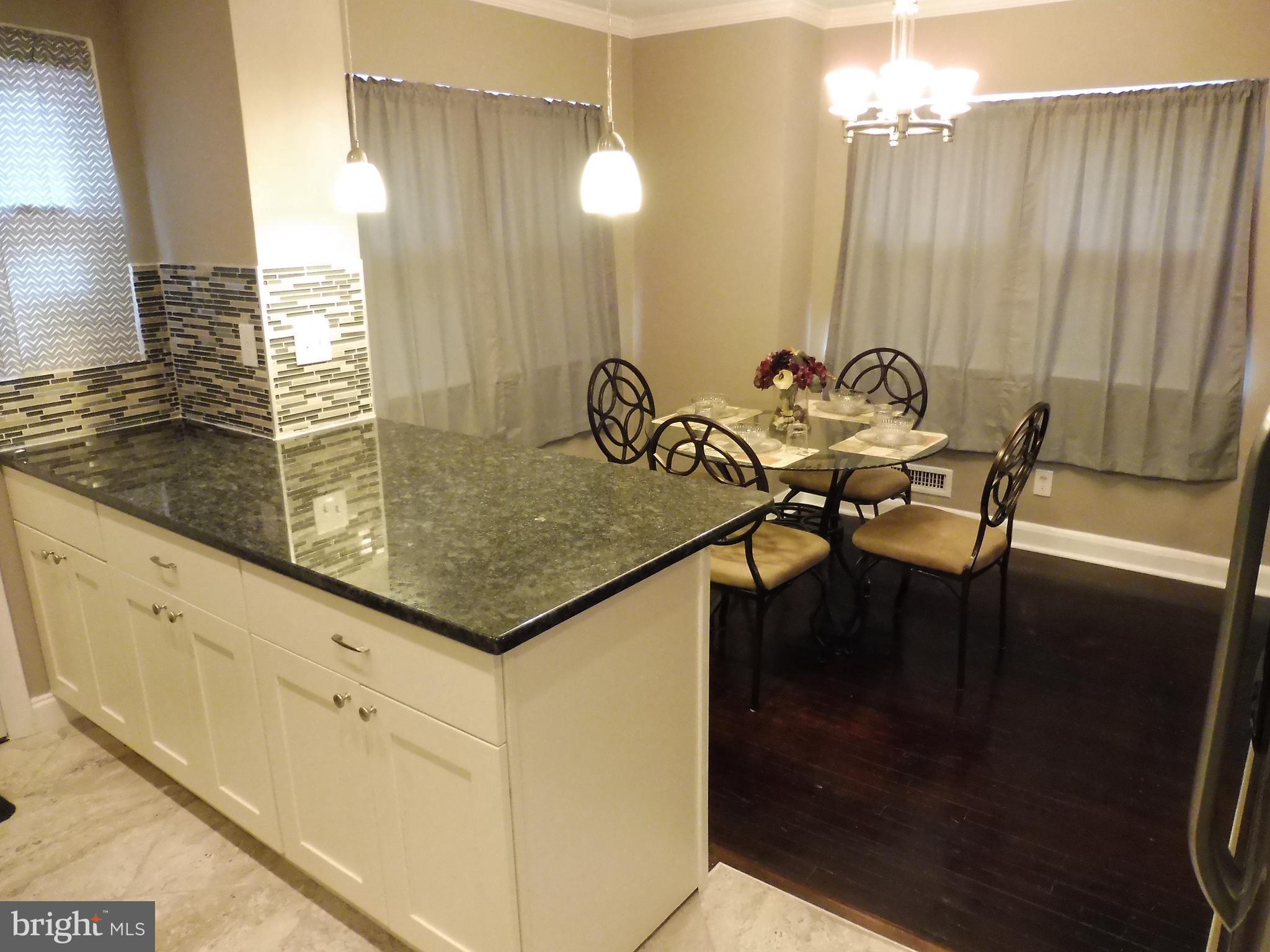 5727 Pimlico Road Baltimore, MD 21209 - Photo 8 of 30 Kitchen View to Dining Room