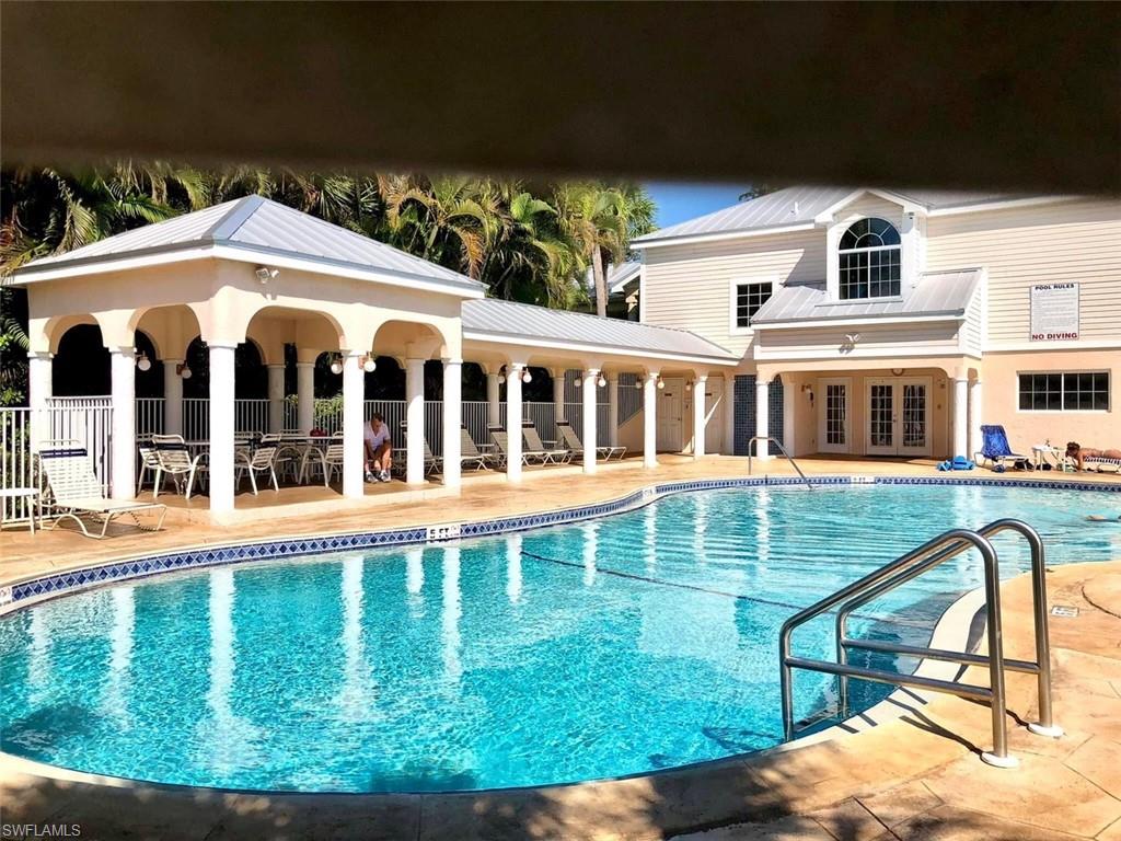 2525 Sailors Way, Unit 139 Naples, FL 34109 - Photo 20 of 20 View of pool with a patio area and french doors