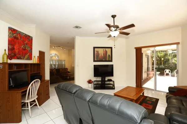 a living room with furniture and a window