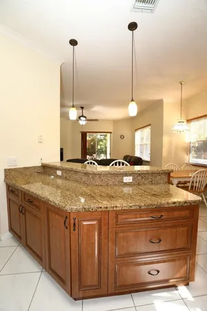 a bedroom with a bed and a table