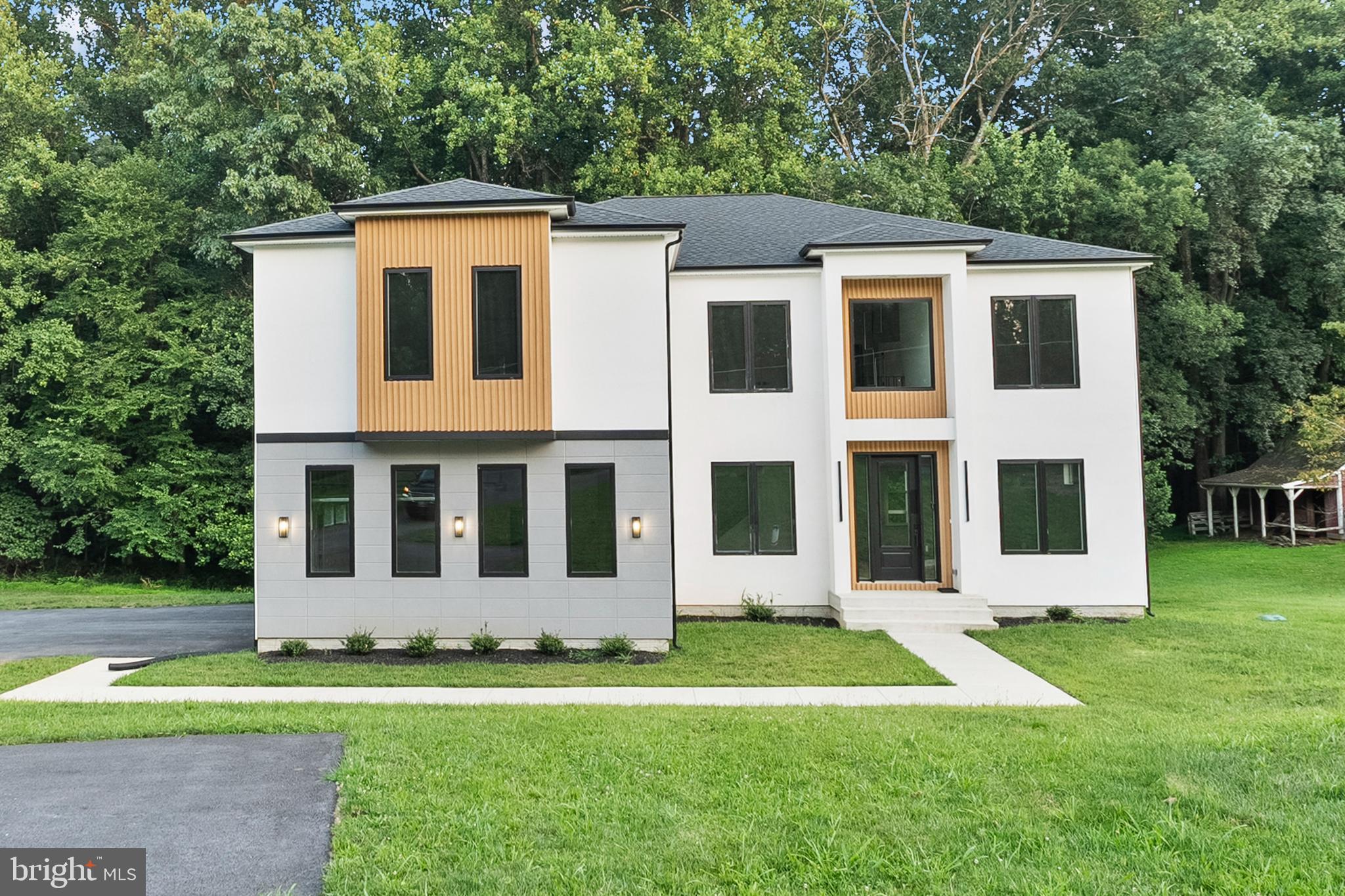 1321 Nicodemus Road Reisterstown, MD 21136 - Photo 1 of 30 front view of a house with a yard