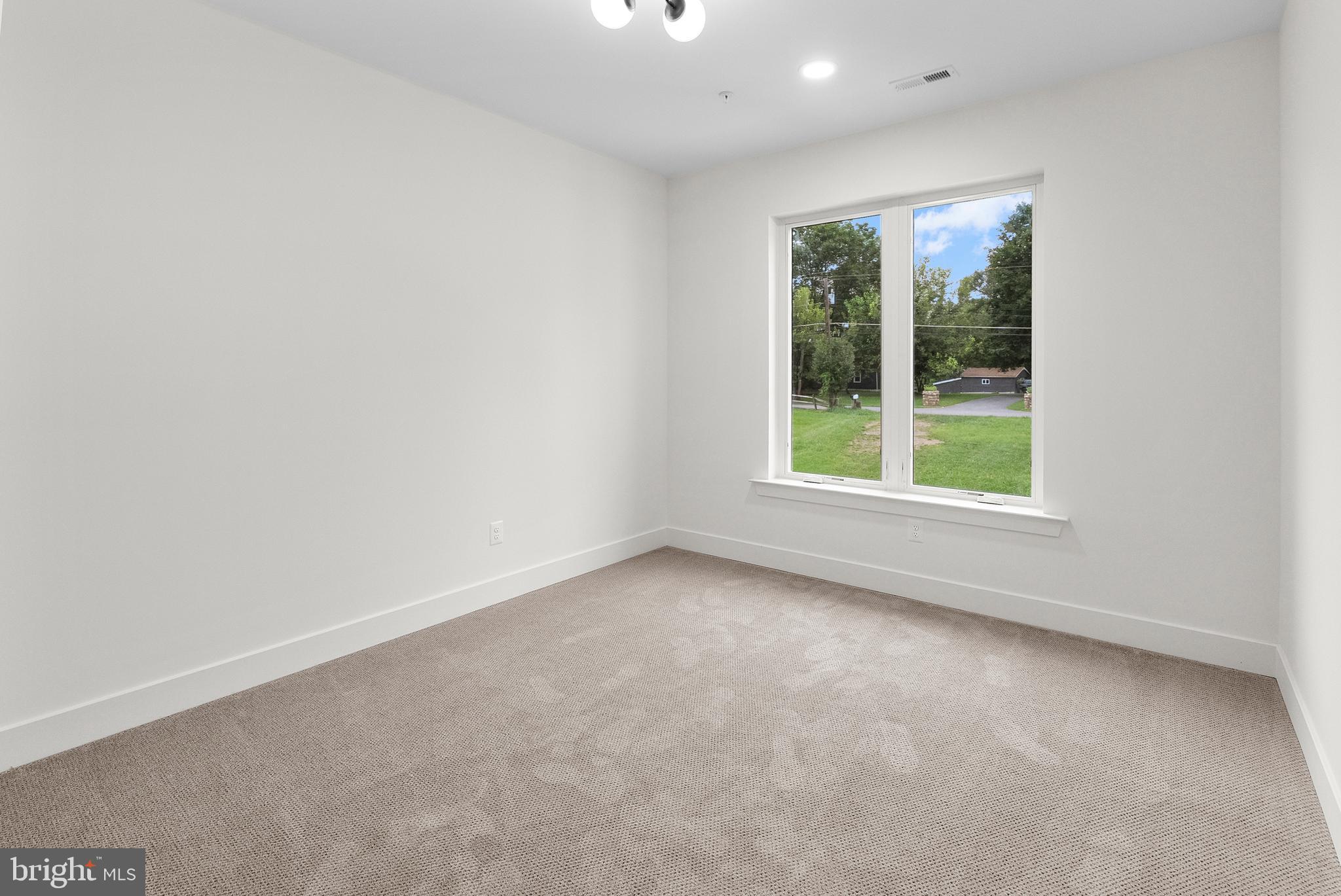 1321 Nicodemus Road Reisterstown, MD 21136 - Photo 12 of 30 an empty room with windows