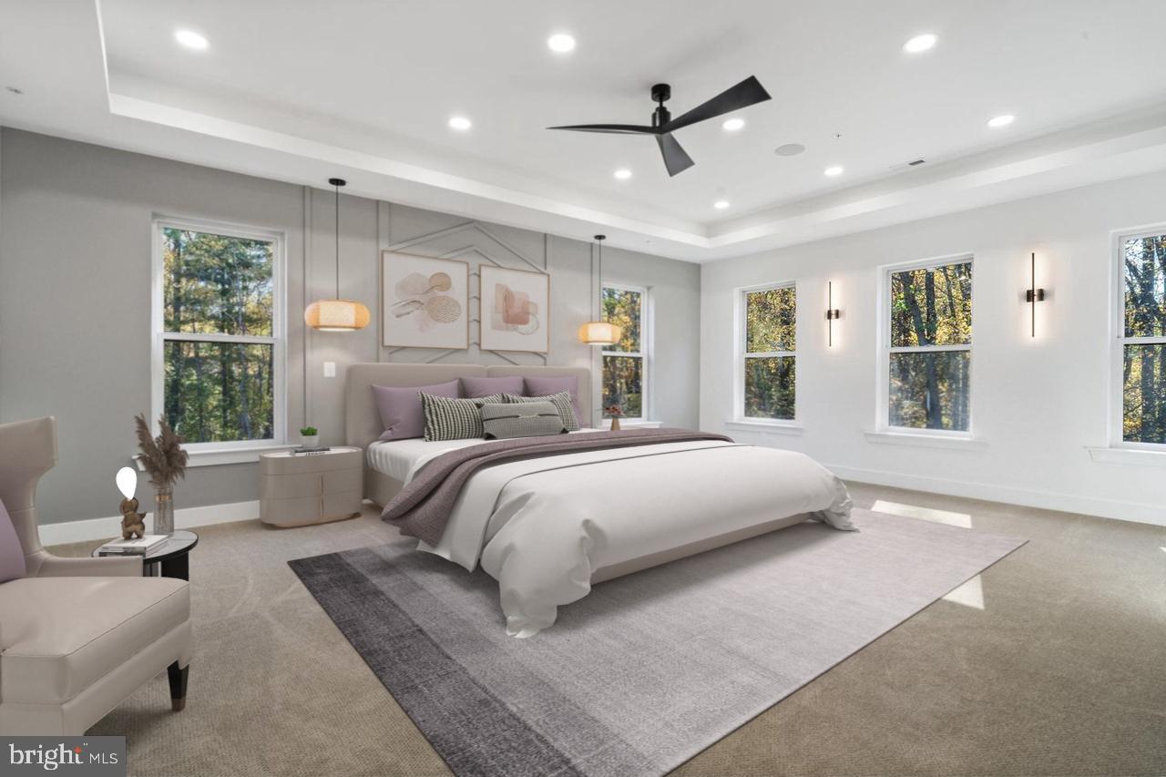 1321 Nicodemus Road Reisterstown, MD 21136 - Photo 16 of 30 a bedroom with a large bed couch and windows