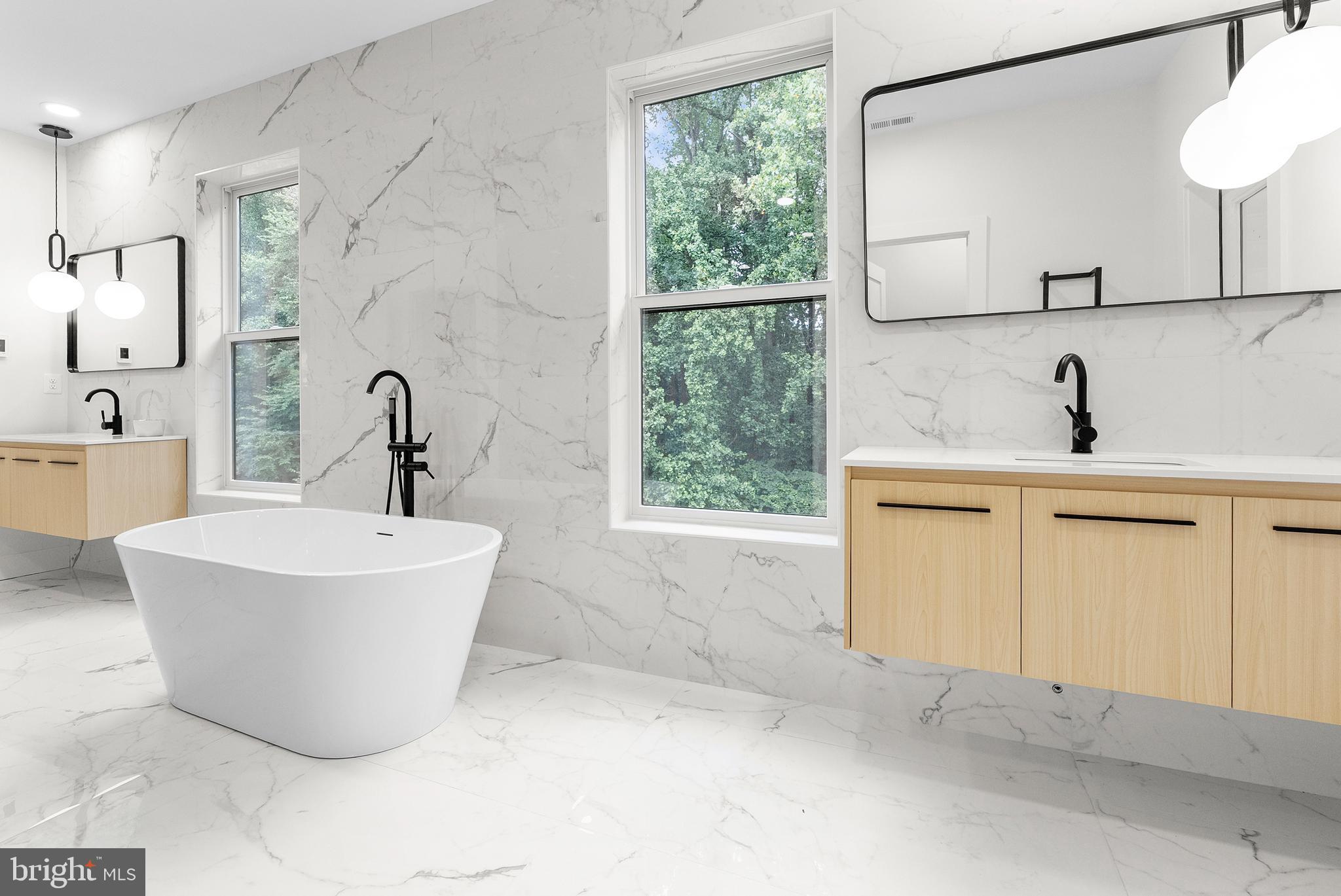 1321 Nicodemus Road Reisterstown, MD 21136 - Photo 21 of 30 a bathroom with a bathtub and sink