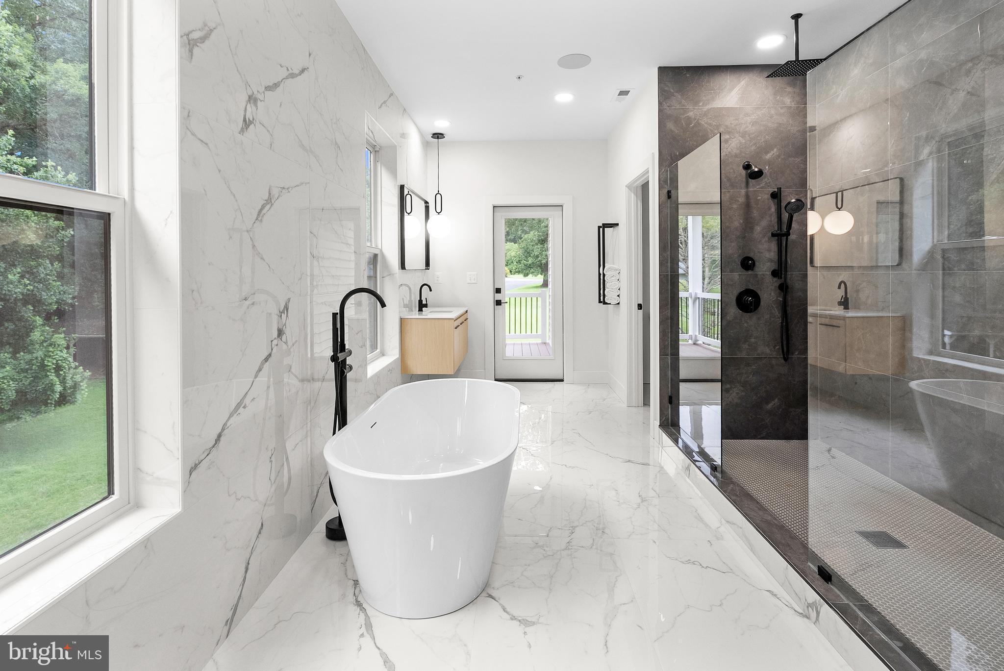 1321 Nicodemus Road Reisterstown, MD 21136 - Photo 22 of 30 a white bath tub sitting next to a bathroom