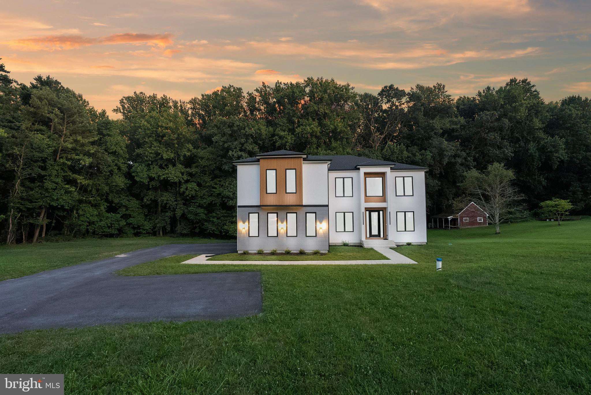 1321 Nicodemus Road Reisterstown, MD 21136 - Photo 27 of 30 a front view of a house with swimming pool and garden