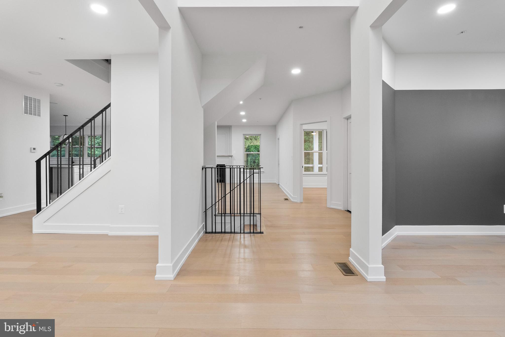 1321 Nicodemus Road Reisterstown, MD 21136 - Photo 2 of 30 a view of a hallway with wooden floor and a living room