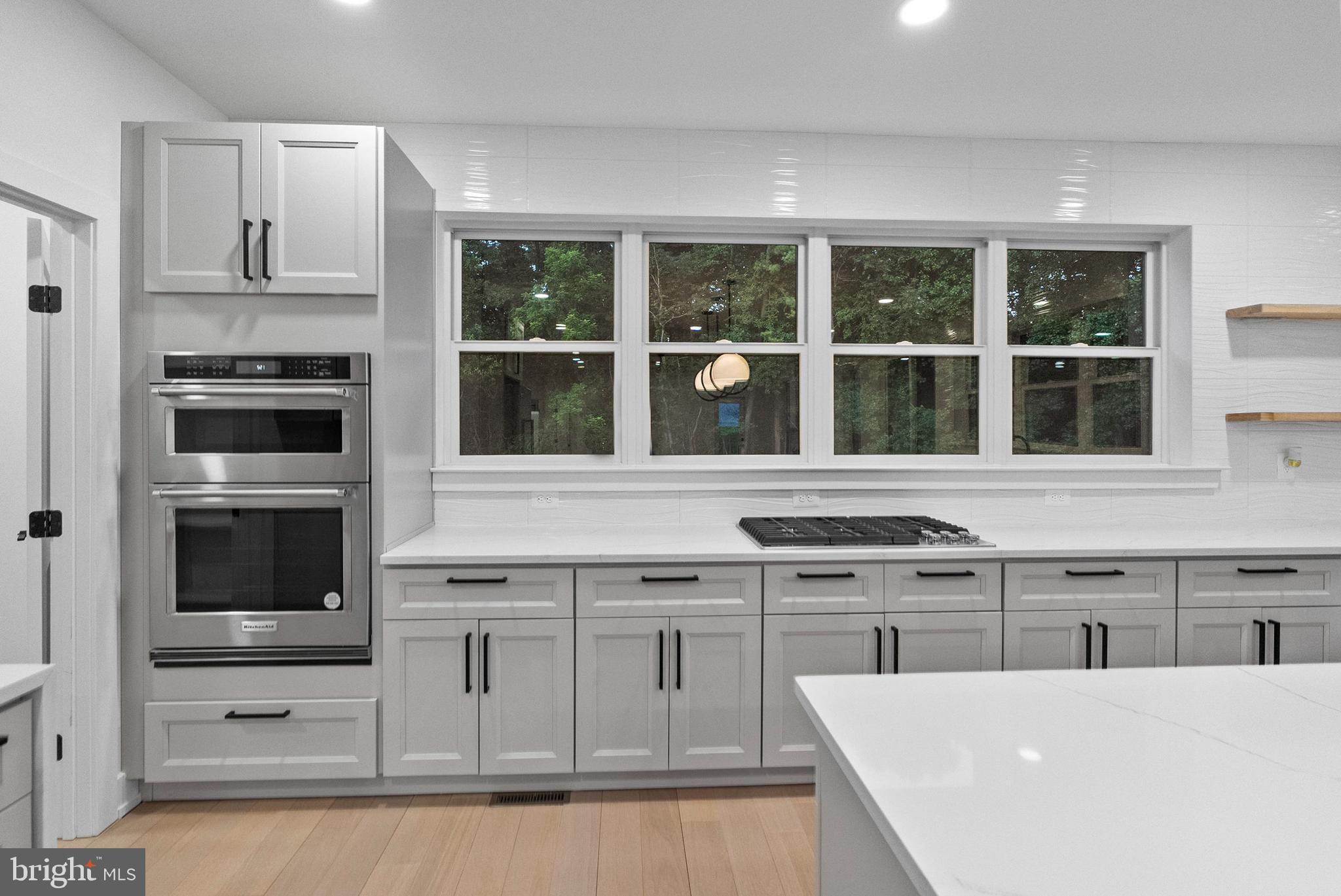 1321 Nicodemus Road Reisterstown, MD 21136 - Photo 7 of 30 a kitchen with stainless steel appliances granite countertop a stove and a refrigerator