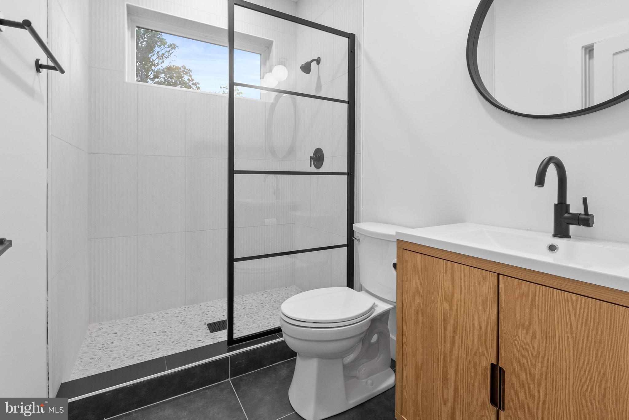 1321 Nicodemus Road Reisterstown, MD 21136 - Photo 9 of 30 a bathroom with a toilet and a sink