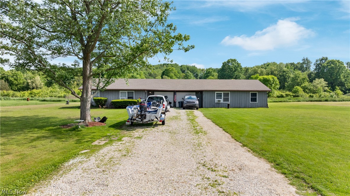 3152 Shaffer Road Atwater, OH 44201 - Photo 1 of 8 Ranch-style house with a front lawn