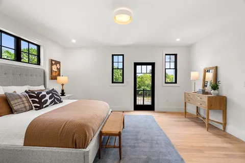 a view of an empty room and a window