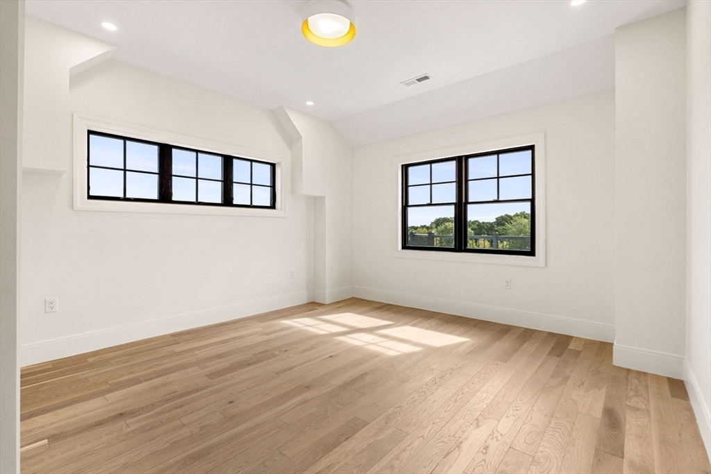 226 Atlantic Street Gloucester, MA 01930 - Photo 27 of 37 wooden floor in an empty room with a window