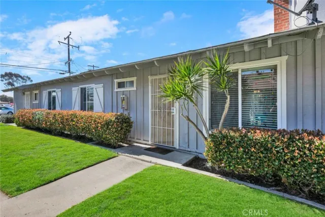 a kitchen with stainless steel appliances granite countertop a stove and a microwave