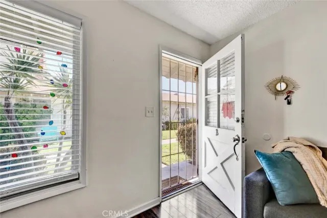 a bedroom that has a bed and a table in it