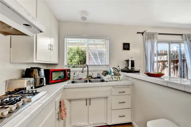 a dining room with furniture and a fireplace