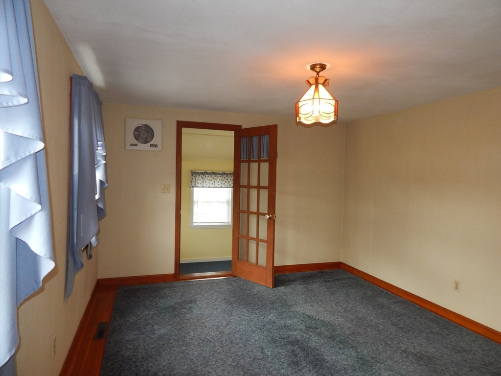 8 Chester Street Montague, MA 01376 - Photo 12 of 32 wooden floor in an empty room with a window